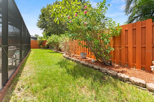 6289 107th Ave N, Pinellas Park, FL 33782 - fenced backyard with glass enclosure