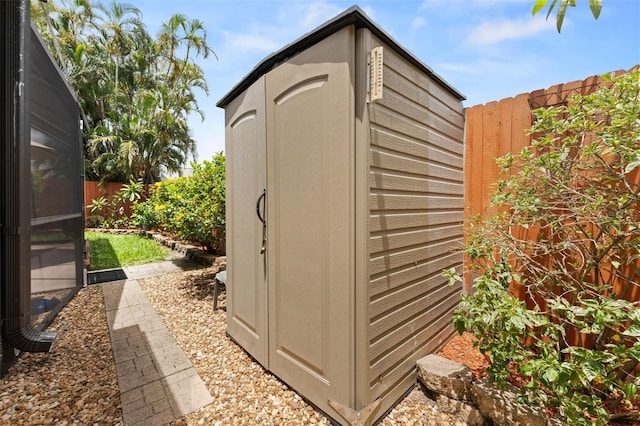 6289 107th Ave N, Pinellas Park, FL 33782 - view of shed with a fenced backyard