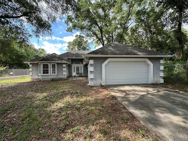 120 Henry St, Interlachen, FL 32148 - ranch-style house featuring stucco siding and driveway