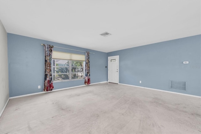 8451 Candlewood Rd Unit 8451, Seminole, FL 33777 - carpeted spare room with baseboards