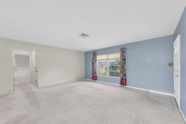 8451 Candlewood Rd Unit 8451, Seminole, FL 33777 - carpeted spare room featuring baseboards