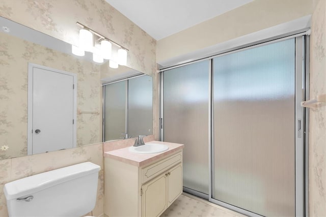 8451 Candlewood Rd Unit 8451, Seminole, FL 33777 - bathroom with vanity, wallpapered walls, an enclosed shower, and tile patterned floors
