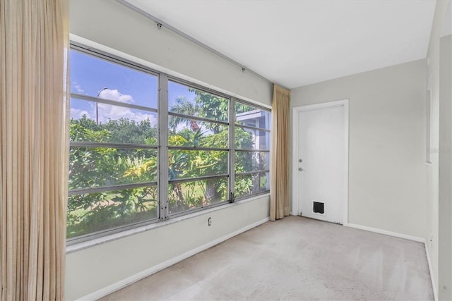 8451 Candlewood Rd Unit 8451, Seminole, FL 33777 - carpeted spare room featuring baseboards