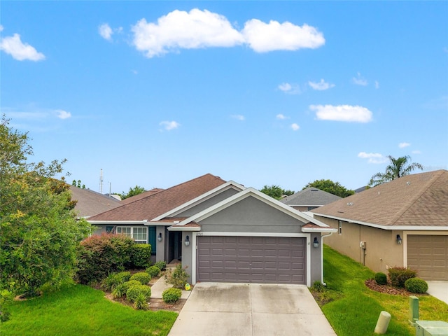 10909 Kirkwall Port Dr, Wimauma, FL 33598 - ranch-style home with a garage, a front lawn, driveway, stucco siding, and roof with shingles