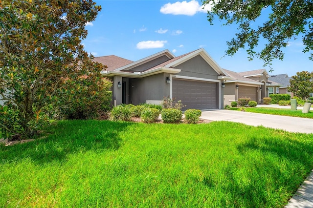10909 Kirkwall Port Dr, Wimauma, FL 33598 - ranch-style home with an attached garage, stucco siding, driveway, and a front yard