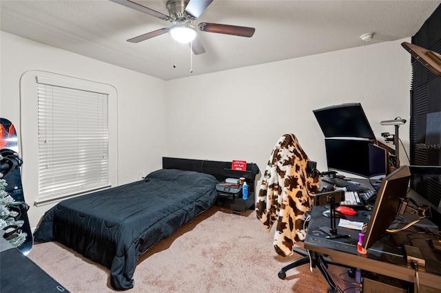 10909 Kirkwall Port Dr, Wimauma, FL 33598 - bedroom with a desk, ceiling fan, and carpet