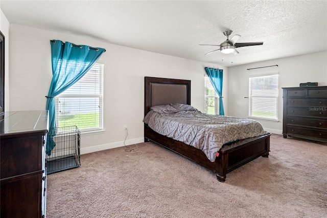 10909 Kirkwall Port Dr, Wimauma, FL 33598 - bedroom with carpet flooring, a textured ceiling, and ceiling fan