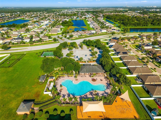 10909 Kirkwall Port Dr, Wimauma, FL 33598 - aerial view of residential area featuring a large body of water and a pool area