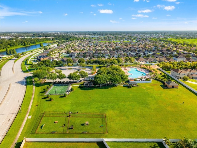 10909 Kirkwall Port Dr, Wimauma, FL 33598 - aerial view of residential area with a large body of water and a pool area