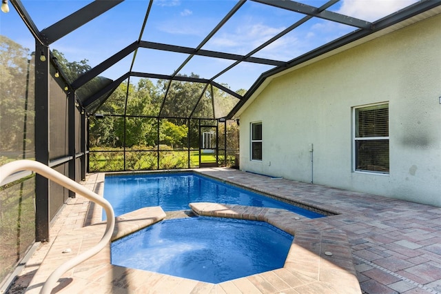 1280 Hill Flower Dr, Brooksville, FL 34604 - view of swimming pool featuring a patio, a pool with connected hot tub, and a lanai