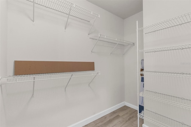 1280 Hill Flower Dr, Brooksville, FL 34604 - spacious closet with wood finished floors