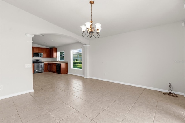 1280 Hill Flower Dr, Brooksville, FL 34604 - unfurnished living room with vaulted ceiling, light tile patterned flooring, arched walkways, a chandelier, and ornate columns