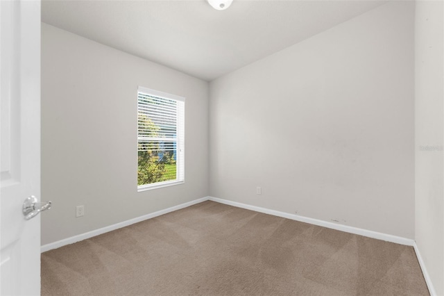 1280 Hill Flower Dr, Brooksville, FL 34604 - carpeted empty room featuring baseboards