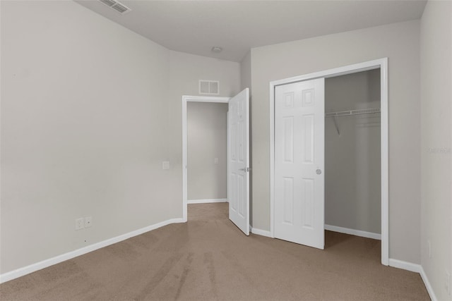 1280 Hill Flower Dr, Brooksville, FL 34604 - unfurnished bedroom with carpet flooring and a closet