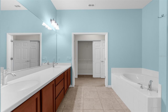 1280 Hill Flower Dr, Brooksville, FL 34604 - full bath featuring a bath, double vanity, and tile patterned floors