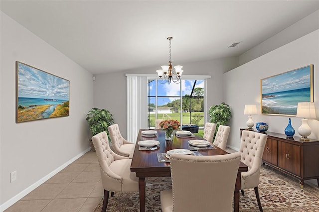 1280 Hill Flower Dr, Brooksville, FL 34604 - dining area featuring a chandelier and light tile patterned floors