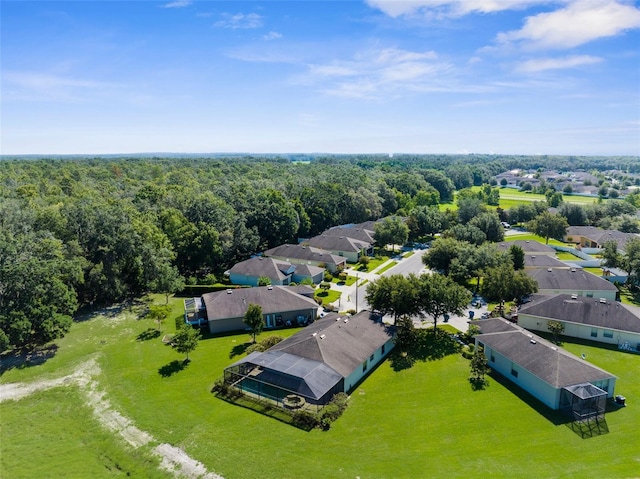 1280 Hill Flower Dr, Brooksville, FL 34604 - aerial perspective of suburban area with a heavily wooded area
