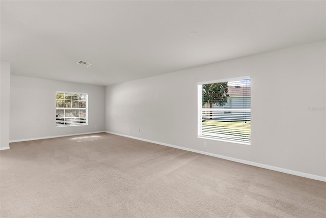 1280 Hill Flower Dr, Brooksville, FL 34604 - carpeted spare room featuring baseboards