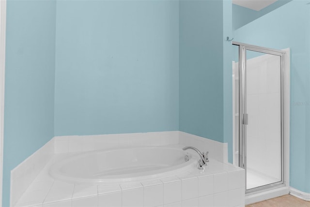 1280 Hill Flower Dr, Brooksville, FL 34604 - bathroom with a bath and a stall shower