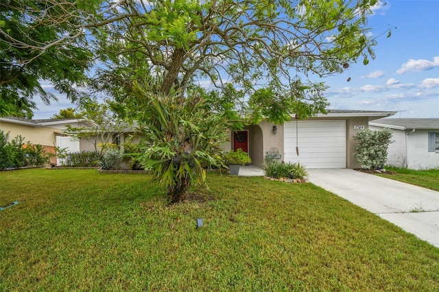 5744 Thrush Dr, New Port Richey, FL 34652 - view of front of house with stucco siding, a garage, concrete driveway, and a front lawn