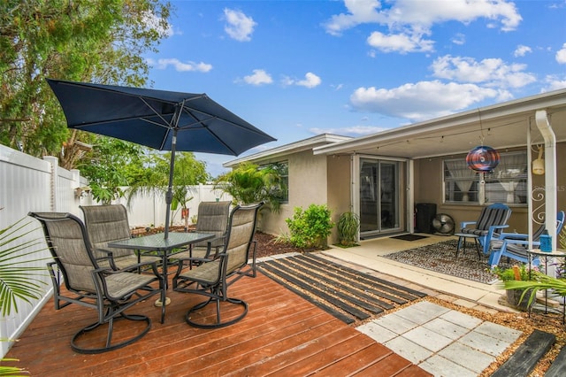 5744 Thrush Dr, New Port Richey, FL 34652 - wooden deck with outdoor dining space