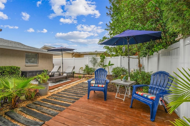 5744 Thrush Dr, New Port Richey, FL 34652 - deck with a fenced backyard