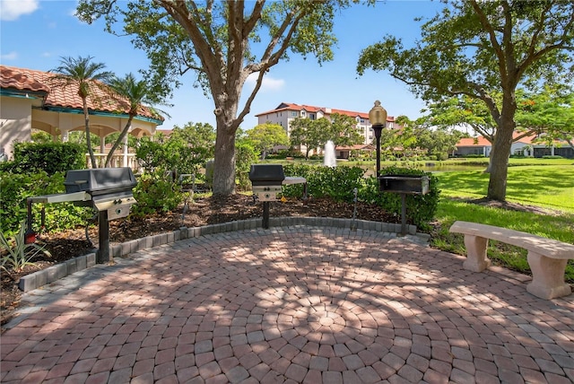 5430 Eagles Point Cir Unit 202, Sarasota, FL 34231 - view of patio / terrace with a grill