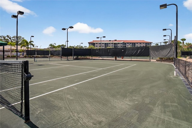 5430 Eagles Point Cir Unit 202, Sarasota, FL 34231 - view of tennis court with community basketball court