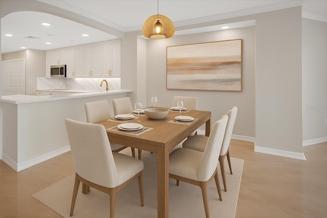 5430 Eagles Point Cir Unit 202, Sarasota, FL 34231 - dining area with recessed lighting and ornamental molding