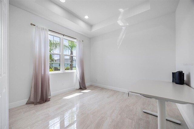 12739 Rainwashed Loop, Parrish, FL 34219 - spare room with a raised ceiling and recessed lighting