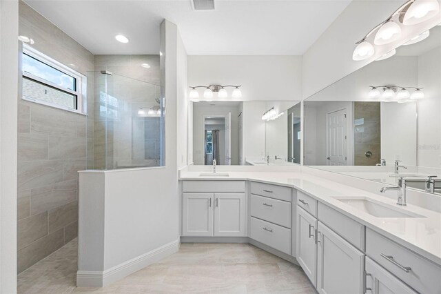 12739 Rainwashed Loop, Parrish, FL 34219 - full bathroom with walk in shower and double vanity