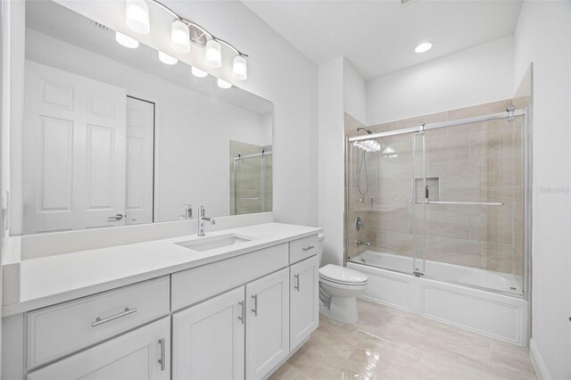 12739 Rainwashed Loop, Parrish, FL 34219 - bathroom with vanity, enclosed tub / shower combo, and recessed lighting