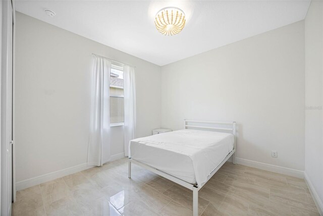 12739 Rainwashed Loop, Parrish, FL 34219 - bedroom with baseboards