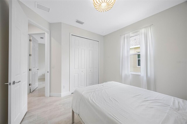 12739 Rainwashed Loop, Parrish, FL 34219 - bedroom with baseboards and a closet