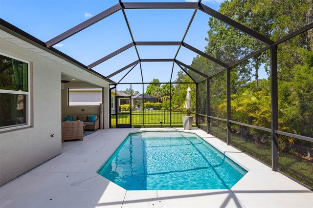 12739 Rainwashed Loop, Parrish, FL 34219 - outdoor pool with a patio area and an outdoor hangout area
