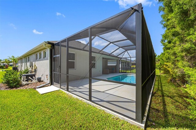 12739 Rainwashed Loop, Parrish, FL 34219 - outdoor pool with a patio area, a lawn, and a lanai