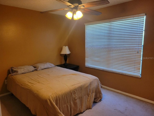 5100 Burchette Rd Unit 1304, Tampa, FL 33647 - bedroom featuring carpet flooring and a ceiling fan
