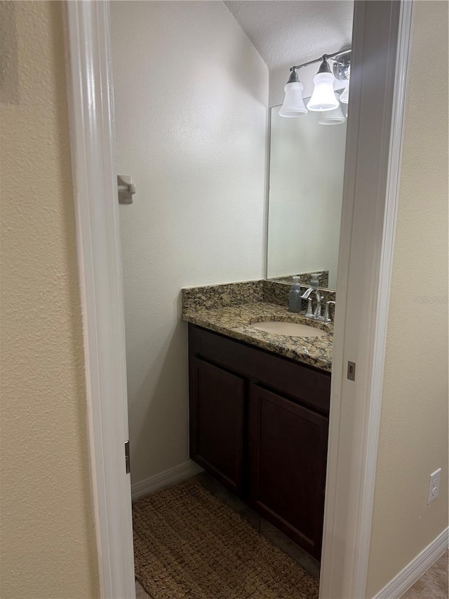 2411 Willimette Dr, Wesley Chapel, FL 33543 - bathroom featuring vanity and baseboards