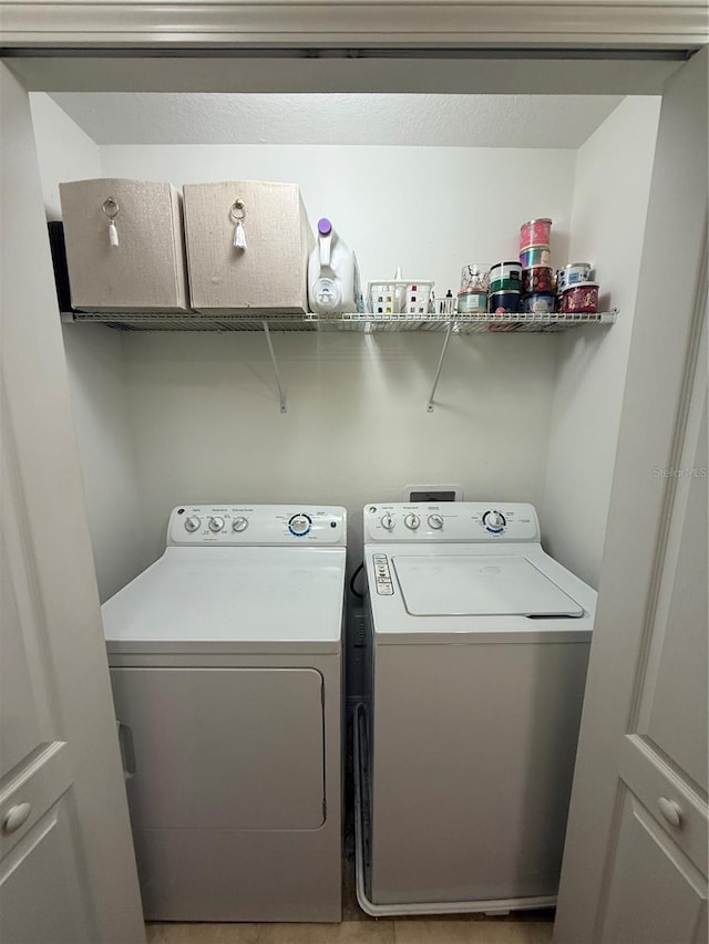2411 Willimette Dr, Wesley Chapel, FL 33543 - washroom with washer and clothes dryer