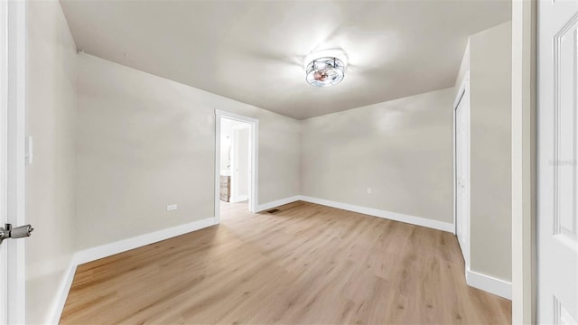 1005 45th St W, Bradenton, FL 34209 - unfurnished room with light wood-type flooring and baseboards