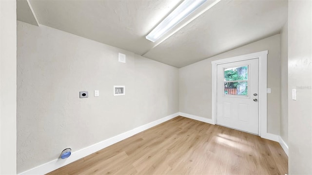 1005 45th St W, Bradenton, FL 34209 - laundry area with electric dryer hookup, light wood-style floors, and hookup for a washing machine