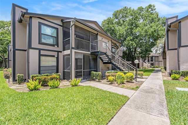 4014 Dream Oak Pl Unit 202, Tampa, FL 33613 - view of property featuring stairs