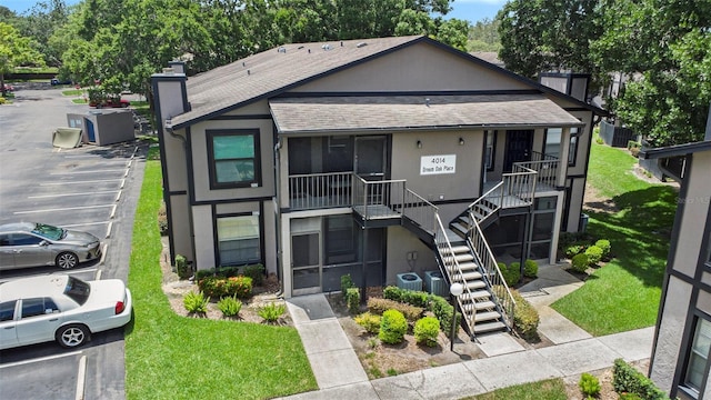 4014 Dream Oak Pl Unit 202, Tampa, FL 33613 - view of property with stairs