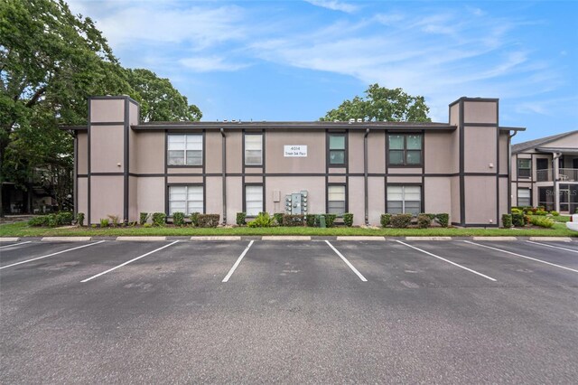 4014 Dream Oak Pl Unit 202, Tampa, FL 33613 - view of property with uncovered parking