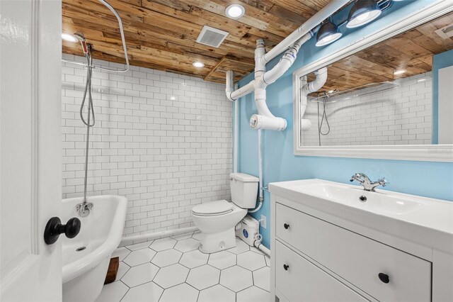 2819 N Central Ave, Tampa, FL 33602 - bathroom featuring tile patterned floors, vanity, wooden ceiling, and  shower combination