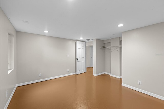 2819 N Central Ave, Tampa, FL 33602 - unfurnished bedroom with finished concrete flooring, a closet, and recessed lighting