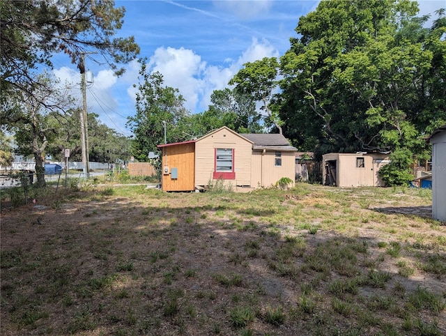 1028 E 93rd Ave Unit A, Tampa, FL 33612 - view of yard featuring a shed