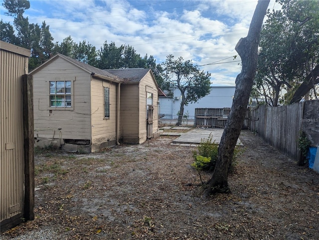 1028 E 93rd Ave Unit A, Tampa, FL 33612 - view of side of property featuring a fenced backyard
