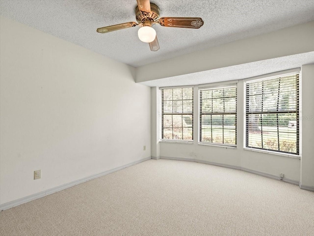 1015 Hastings Ct, Lutz, FL 33548 - empty room with carpet flooring, a textured ceiling, and a ceiling fan