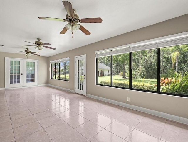 1015 Hastings Ct, Lutz, FL 33548 - empty room featuring light tile patterned floors, french doors, and ceiling fan